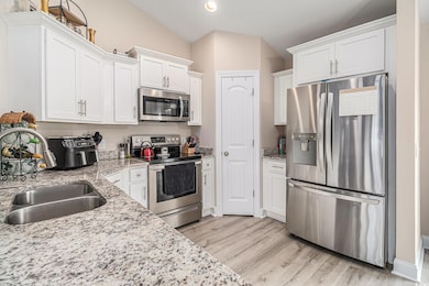 Kitchen featuring appliances with stainless steel 
