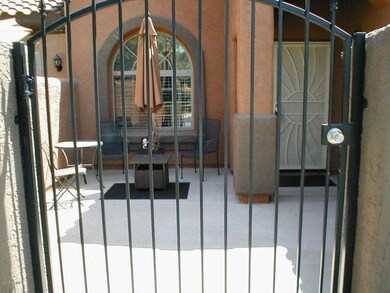 Gated front courtyard patio