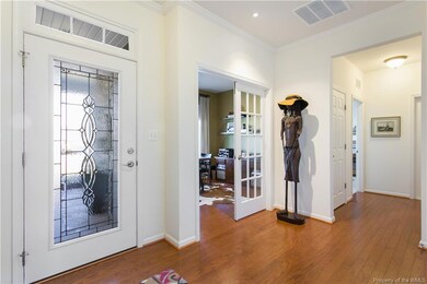 Foyer with entry to office