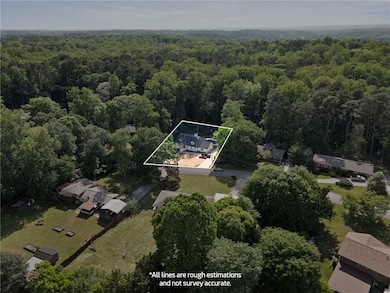 Bird's eye view featuring a view of trees