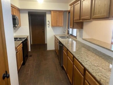 Kitchen featuring sink, appliances with stainless 