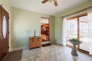 Breezeway entrance between garage and house with a
