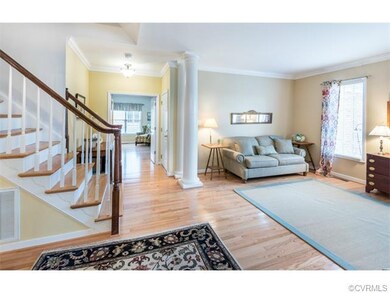 View from entry to living room and 1st floor bedro