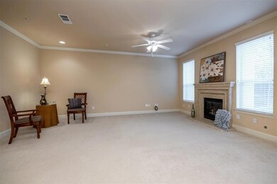 Spacious living area boasts of beautiful, decorati