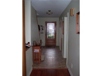 Foyer. Living room to foyer. Note the decorative g