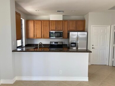 410 Via Villagio, Hypoluxo, FL 33462 - photo 2