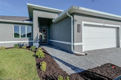View of front of property featuring a front yard a