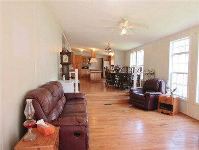 Large den is open to the kitchen, dining and livin