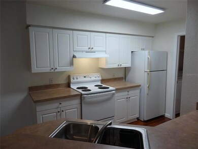 Kitchen featuring breakfast bar