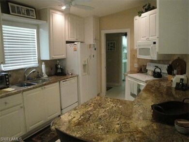 Bright fully equipped kitchen with upgraded granit