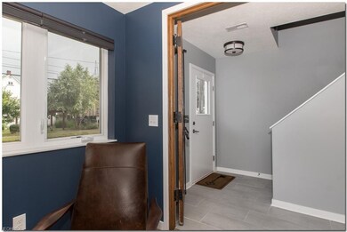 Window treatments on all windows here, front door 