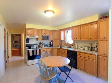Kitchen is bright and offers ample...