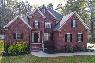 Nice curb appeal. Home sits back off road. Seasona