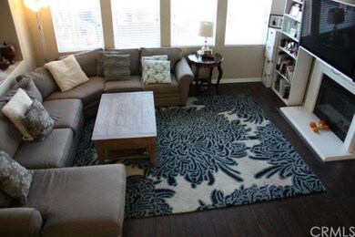 Spacious Living Room with Cozy Fireplace