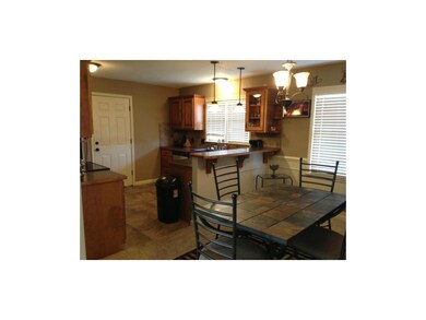 Kitchen and dining room taken from living room