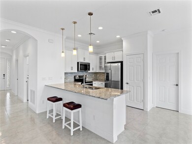 Barstool seating at large kitchen island