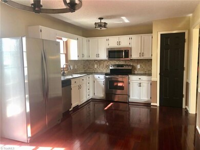 All appliances stay including fridge.  Pantry to the right. New fixtures.