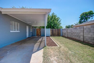 Side Yard and Carport