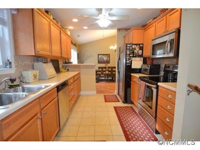Kitchen with breakfast bar.