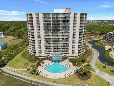 View of apartment building / complex featuring a w