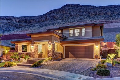 View of front of property with an attached garage,