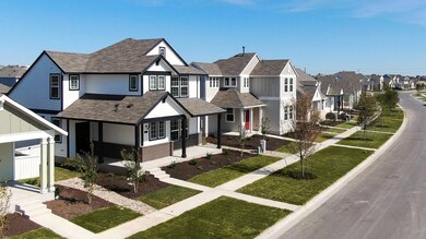 View of front facade with a shingled roof, a resi