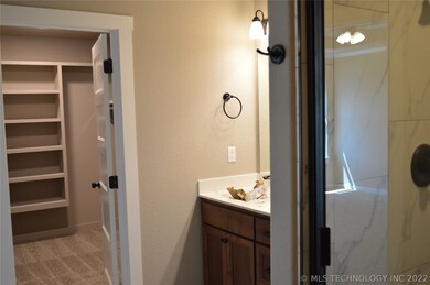 Master bathroom and walk in closet.