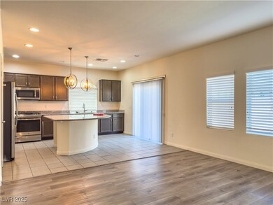 Kitchen featuring appliances with stainless steel