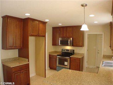 Kitchen - New flooring, new sink and disposal, new