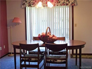 Dining Room Spacious, sunlit dining room leads to 