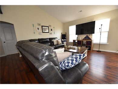 The living room is quite large. Vaulted ceiling. N