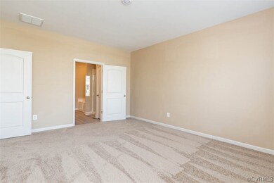 Spacious and private 1st floor master suite. Photo