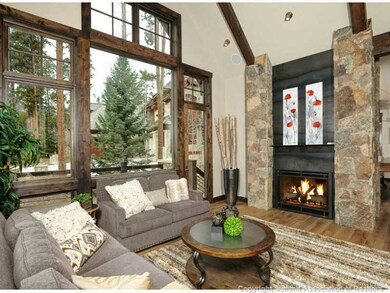 Living Room. Deck off of living area offering view