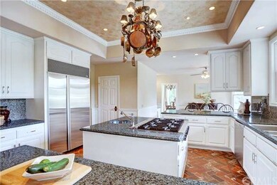The bright and open kitchen features Subzero, Viki