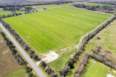 This land showcases a large, open plot of land wit