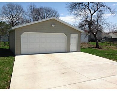 Parking Lot/Garage. New 2 1/2 car garage with open