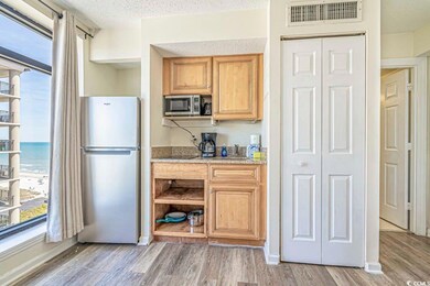 Kitchen with open shelves, plenty of natural light