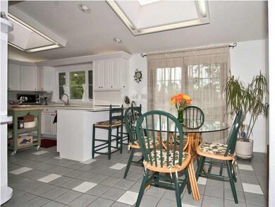 informal eating area w/sliders onto deck overlooki