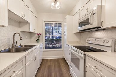Stylish new kitchen featuring updated floors, wood