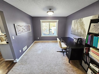 Office/Dining area of the FR and kitchen.