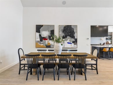Dining area featuring wood finished floors