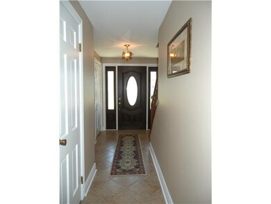 Foyer NEUTRAL TILE FLOOR PELLA DOOR & SIDELIGHTS