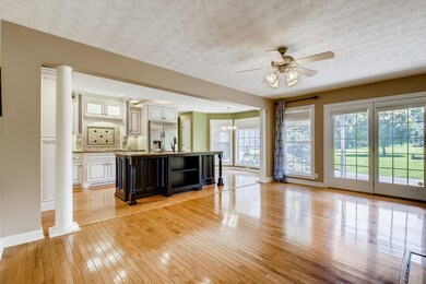 Awesome open floor plan. Beautiful hardwood floors in kitchen, living  and foyer.  The backside of the home is a wall of windows.  French doors lead you out to your covered patio.