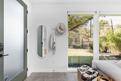 Entryway with concrete floors