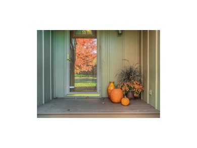 Welcoming front porch to this lovely home.