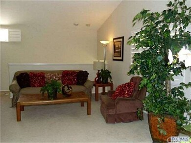 Open iving room with lots of light. Plantation shu