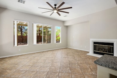 Family room featuring a ceiling fan and plenty of