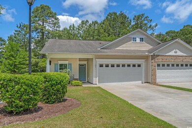 View of front of home featuring an attached garage