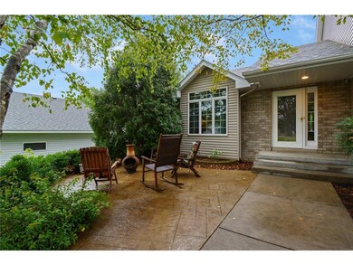 Inviting front entry with stamped concrete patio