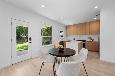 Dining space featuring light wood-style floors, p